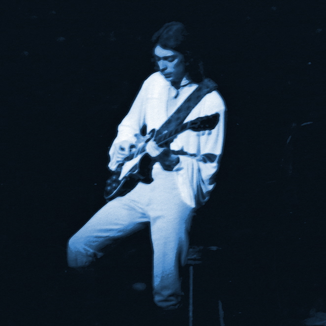 STEVE HACKETT OF GENESIS PERFORMING LIVE IN BERKELEY, CALIFORNIA ON APRIL 29, 1976. PHOTO BY BEN UPHAM. MAGICAL MOMENT PHOTOS.