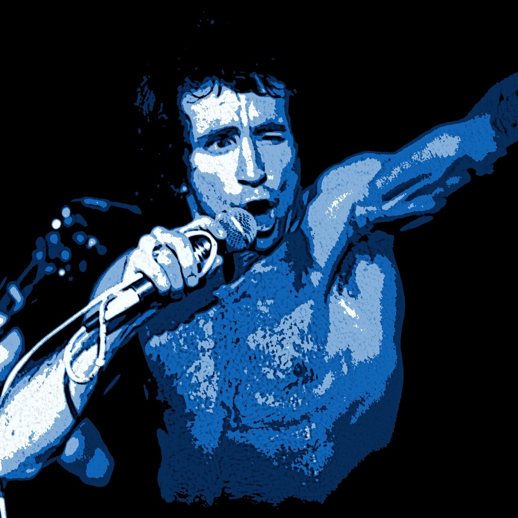 AC DC BON SCOTT OF AC-DC PERFORMING LIVE IN SPOKANE, WA. ON 7-26-78. PHOTO BY BEN UPHAM. MAGICAL MOMENT PHOTOS.