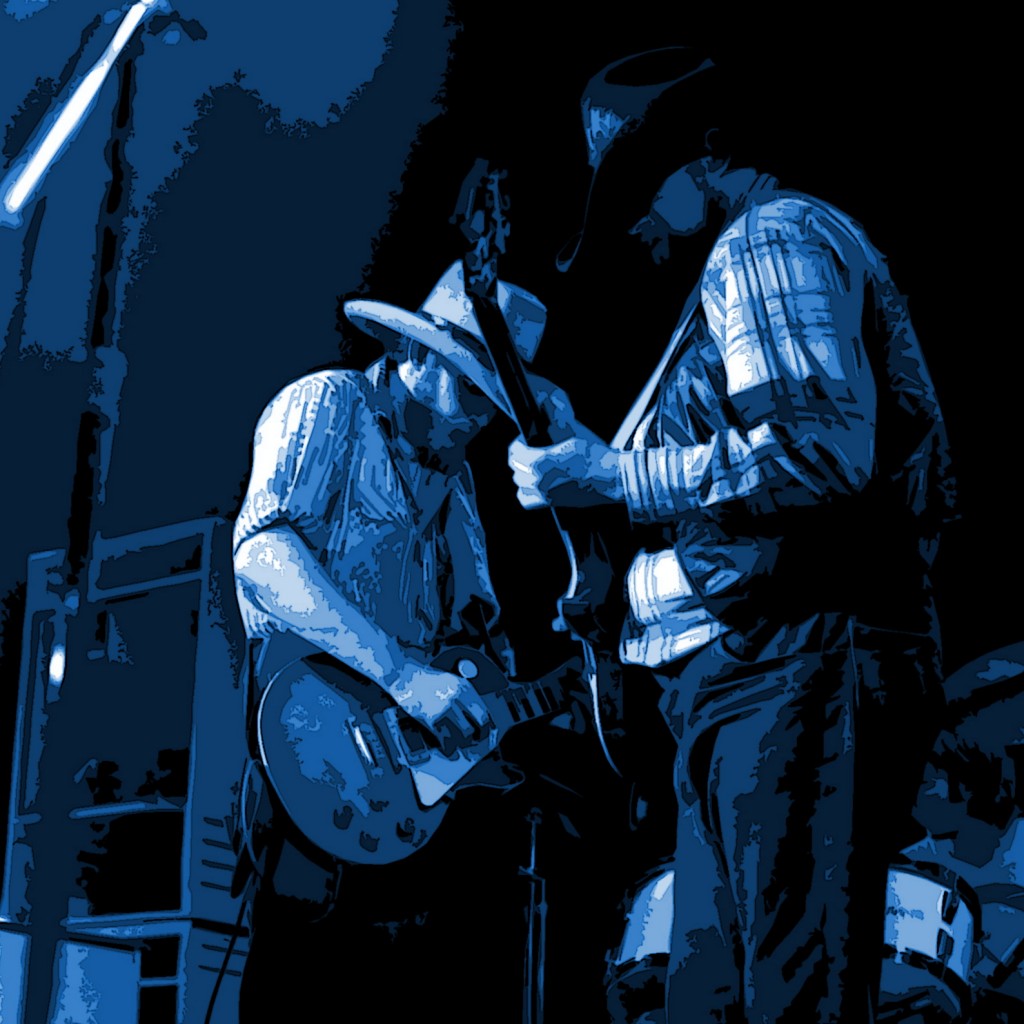 CHARLIE DANIELS BAND LIVE TOM CRAIN AND CHARLIE DANIELS ROCKING OUT AT WINTERLAND ON 12-13-75. PHOTO BY BEN UPHAM.MAGICAL MOMENT PHOTOS.